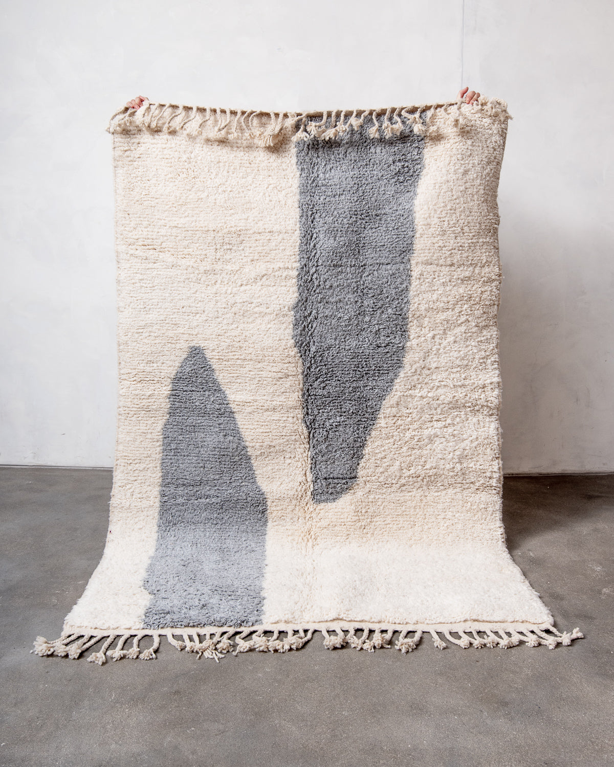 Modern, designer, handcrafted Berber rug from Morocco. Beniourain carpet with beautiful colours and patterns and fluffy wool texture.